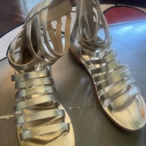 🔥🔥Beautiful gold gladiators a must have ankle length free people never worn❤️